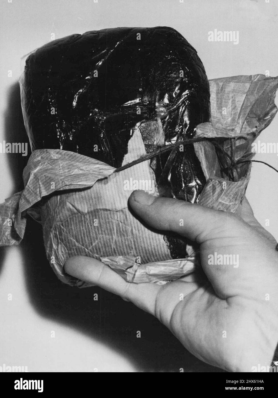 Zwei Pfund Opium aus Abdul Gaffoor. Im Wert von ca. £200. 02. Februar 1953; zwei Pfund Opium-Päckchen von Abdul Gaffoor. Im Wert von ca. £200. Stockfoto