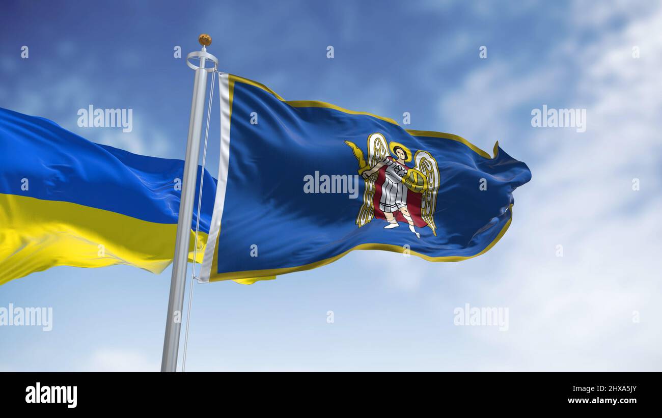 Die Stadtflagge von Kiew mit der Darstellung des Erzengels Gabriel, der mit der ukrainischen Nationalflagge winkt. Der Schutzpatron des Kiewer Erzengels Michael Stockfoto