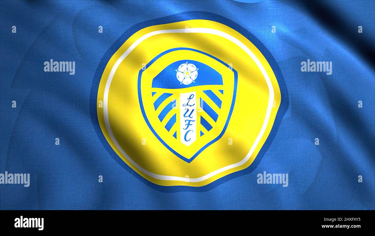 Animiertes Logo des Fußballvereins West Yorkshire Leeds United. Bewegung. Gelbes, rundes Emblem auf blauem, winkenden Hintergrund. Nur für redaktionelle Zwecke. Stockfoto