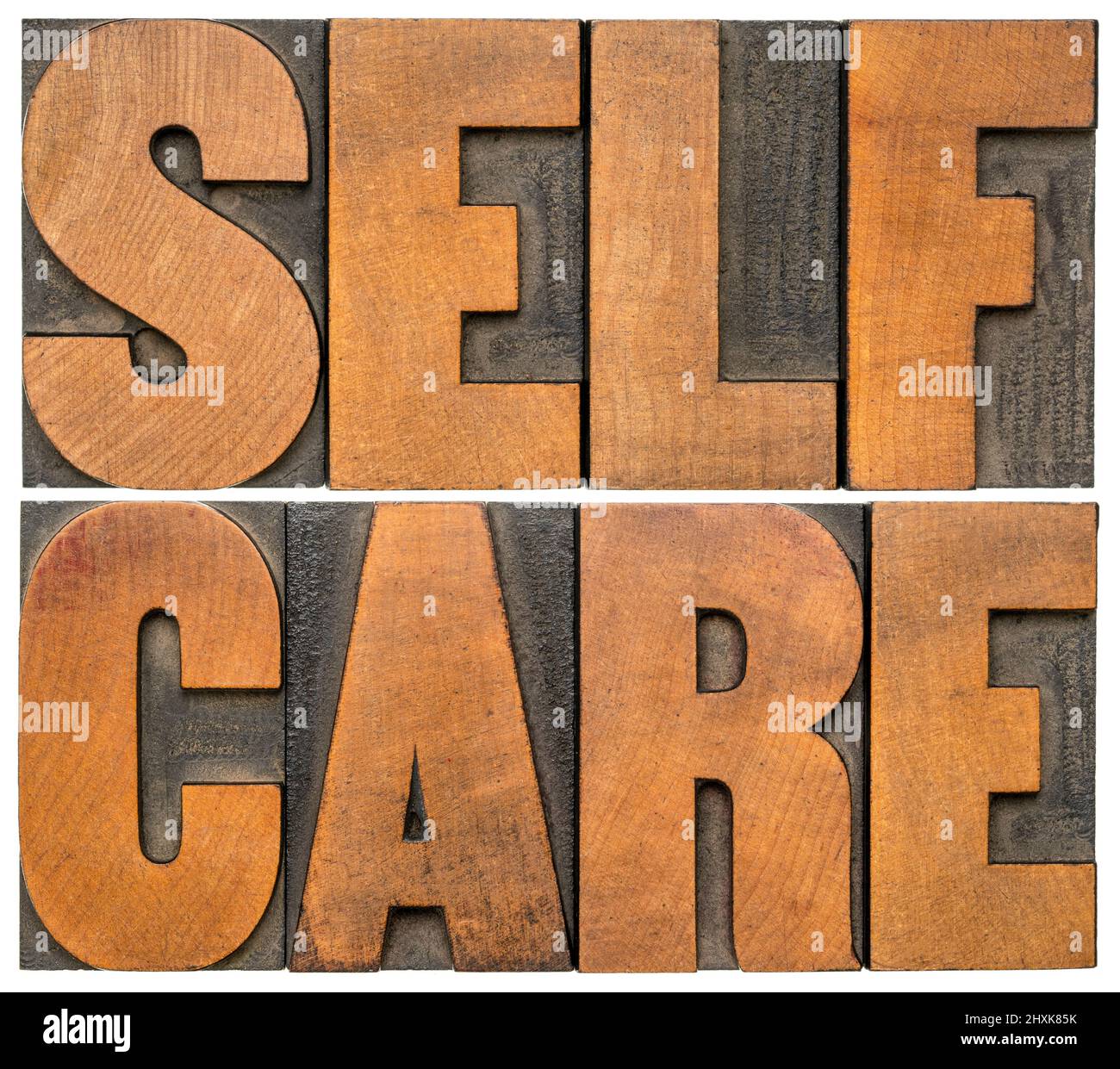 Self Care - isoliert Wort abstrakt in Vintage-Buchdruck Holzart - geistige, emotionale und körperliche Gesundheit Konzept Stockfoto