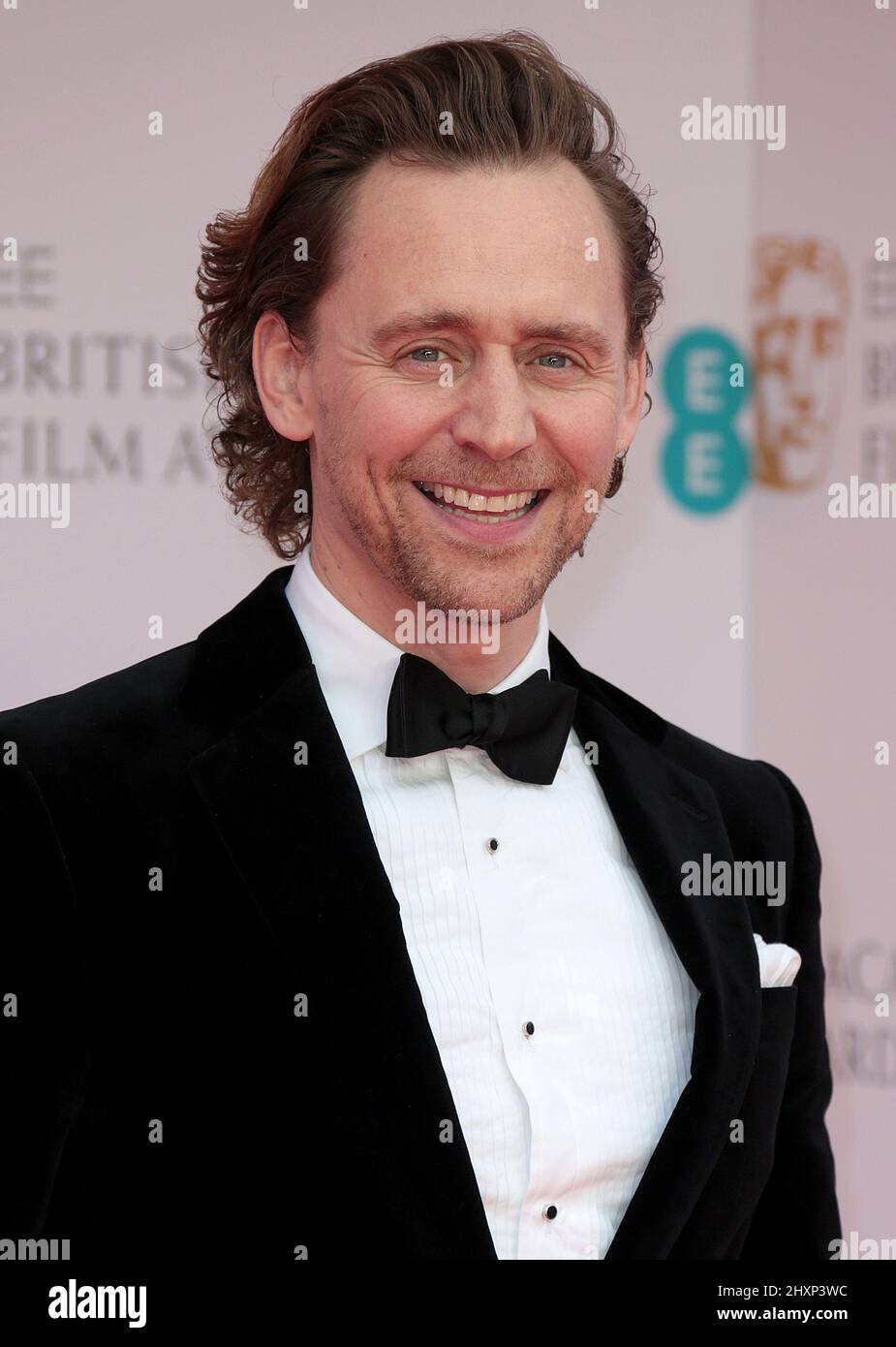 Mär 13, 2022 - London, England, Großbritannien - Tom Hiddleston nimmt an den BAFTA Film Awards 2022 in der Royal Albert Hall Teil Stockfoto