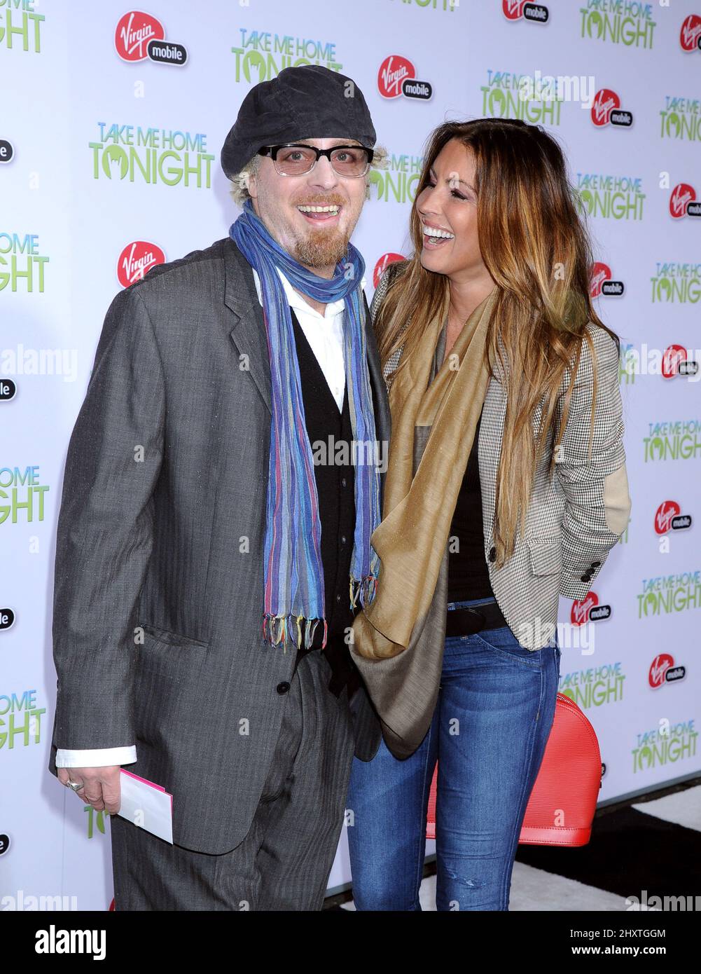 Leif Garrett und Rachel Uchitel während der Take Me Home Tonight-Premiere im Regal Cinemas L.A. Leben, in Los Angeles, Kalifornien Stockfoto