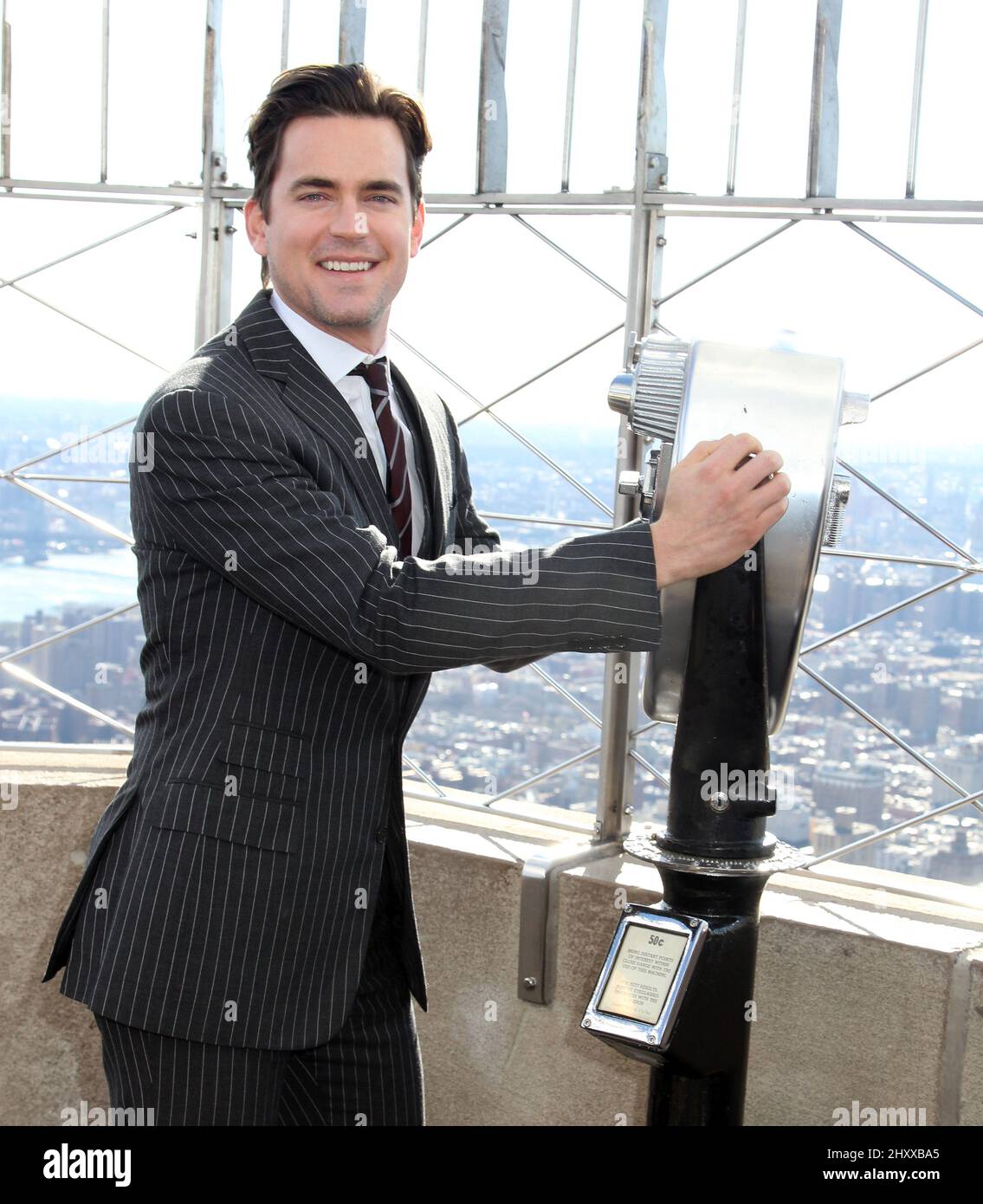 Matt Bomer aus der USA Network-Serie 'White Collar' besucht das Empire State Building in New York, USA. Stockfoto