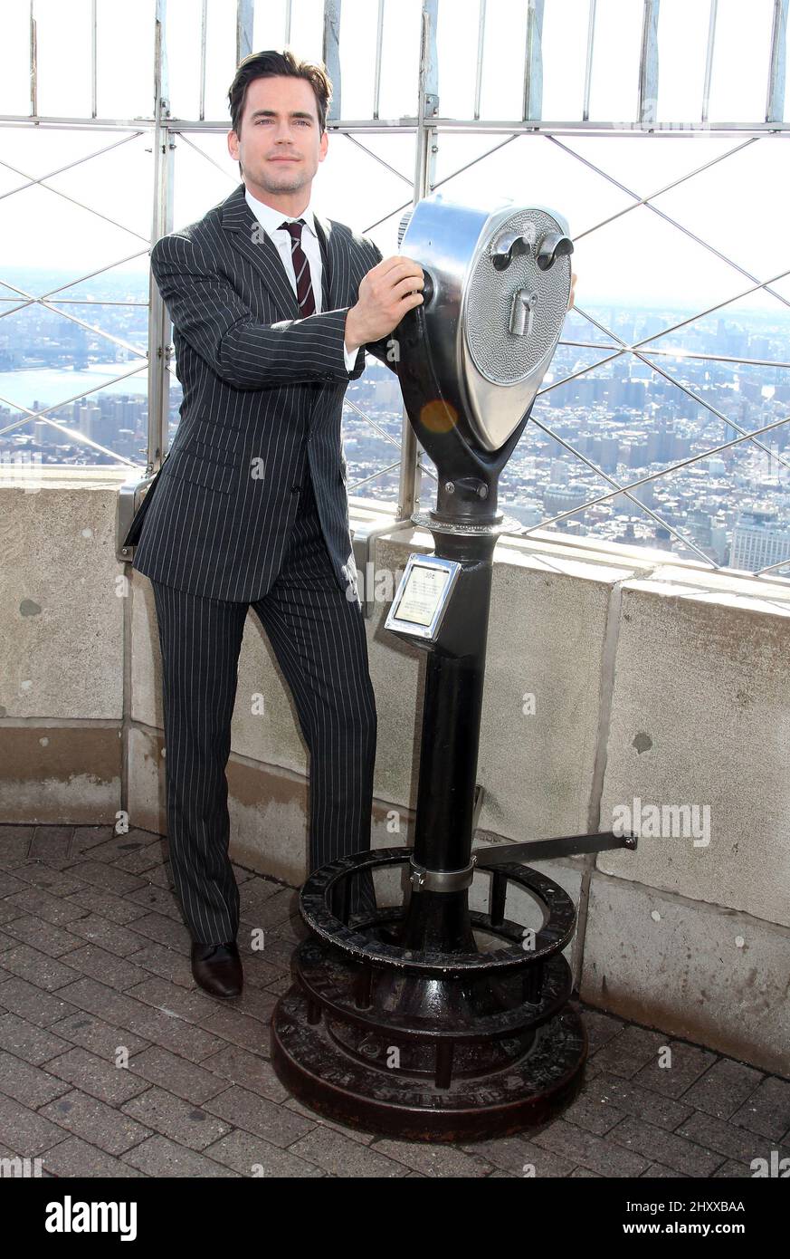 Matt Bomer aus der USA Network-Serie 'White Collar' besucht das Empire State Building in New York, USA. Stockfoto