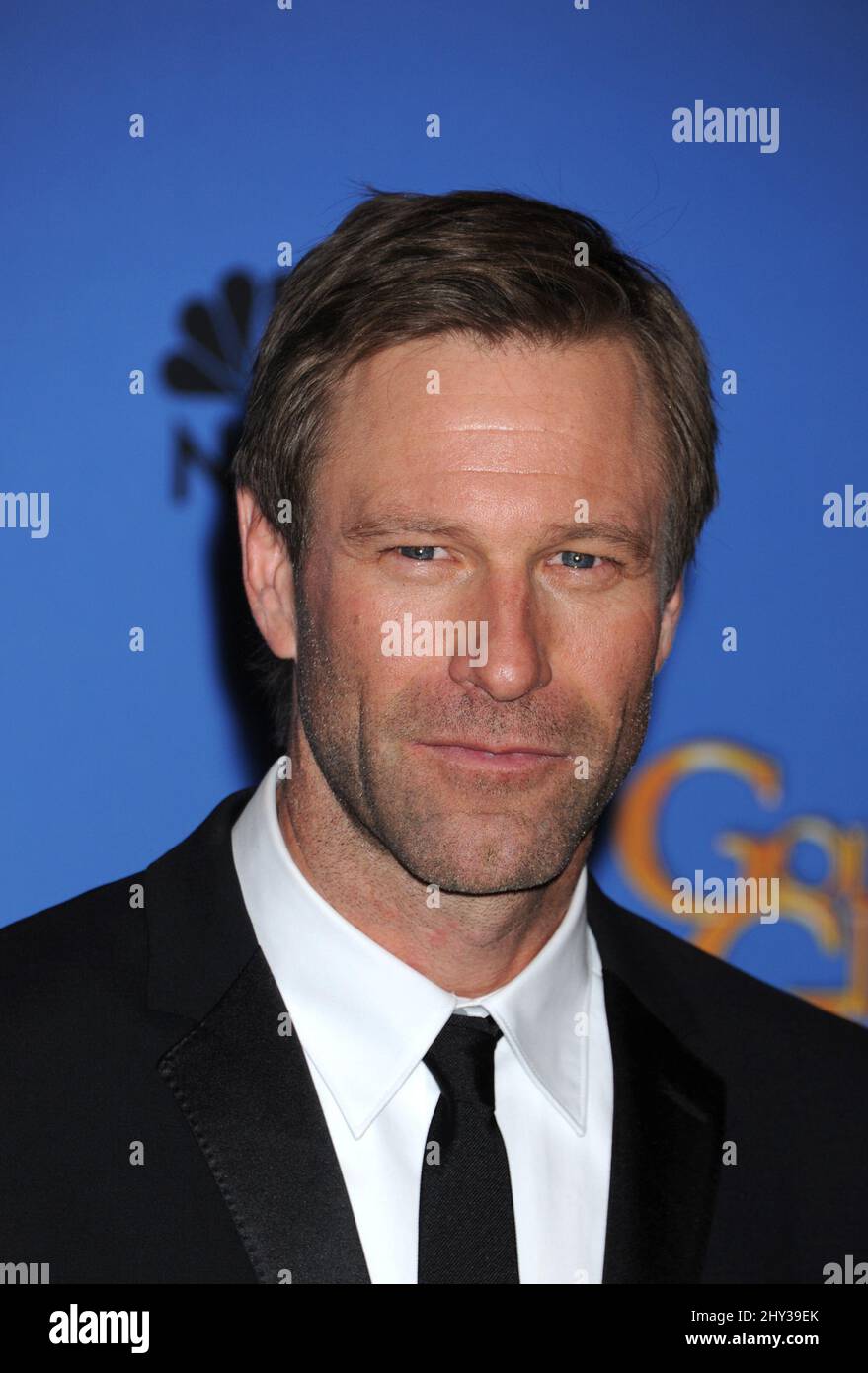 Aaron Eckhart im Pressenzimmer der jährlichen Golden Globe Awards 71., die am 12. Januar 2014 im Beverly Hilton Hotel verliehen wurden. Stockfoto