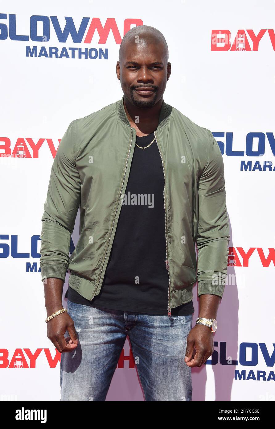 Amin Joseph nimmt am ersten Baywatch SlowMo Marathon Teil, einem zermürbenden 0,2km, der komplett in Zeitlupe auf dem Microsoft Square in Los Angeles ausgetragen werden muss Leben in Los Angeles, USA Stockfoto