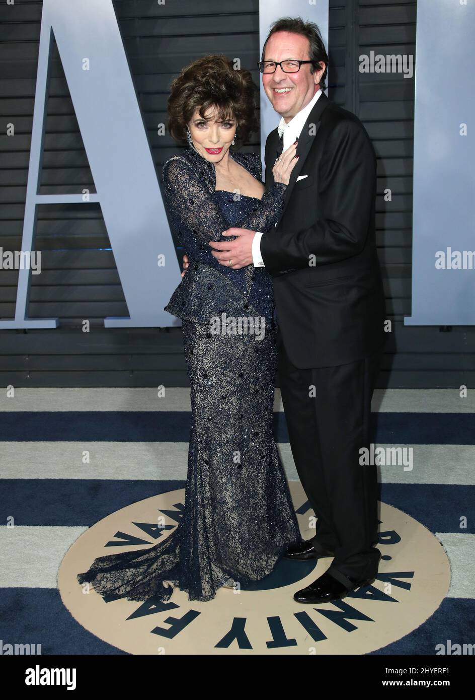 Joan Collins, Percy Gibson bei der Vanity Fair Oscar Party in Beverly Hills, Los Angeles, USA Stockfoto