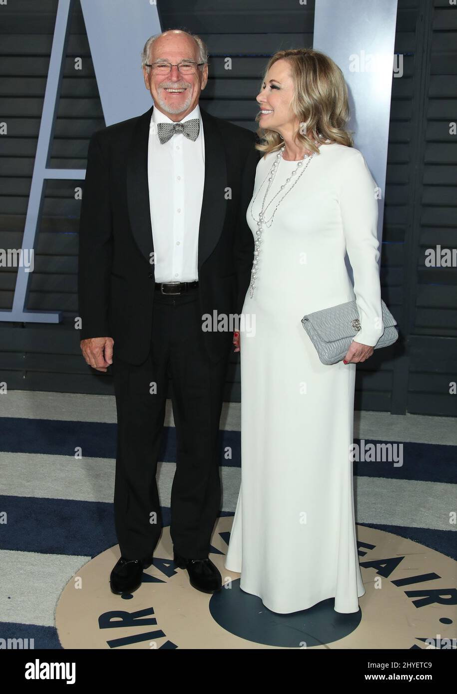Jimmy Buffett und Jane Slagsvol nehmen an der Vanity Fair Oscar Party