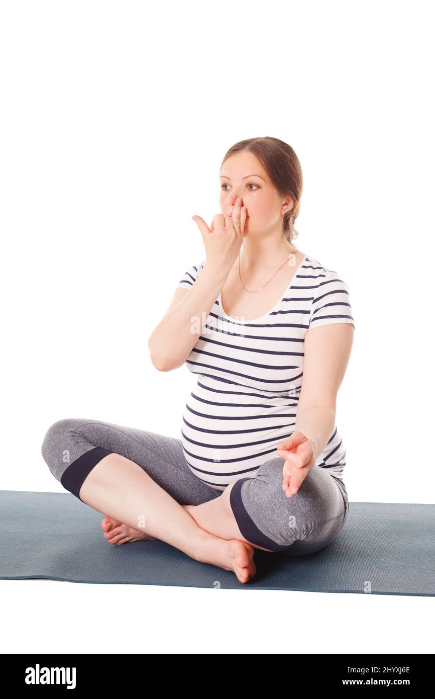 Schwanger Frau tut Yoga Atmung Übung Pranayama Stockfoto