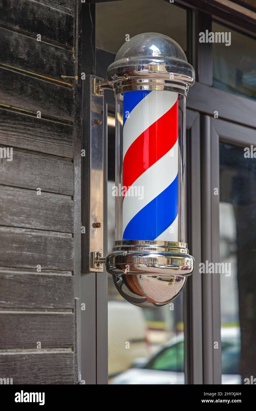 Friseur Pole Retro Swirl Schild im Friseur Shop Stockfoto