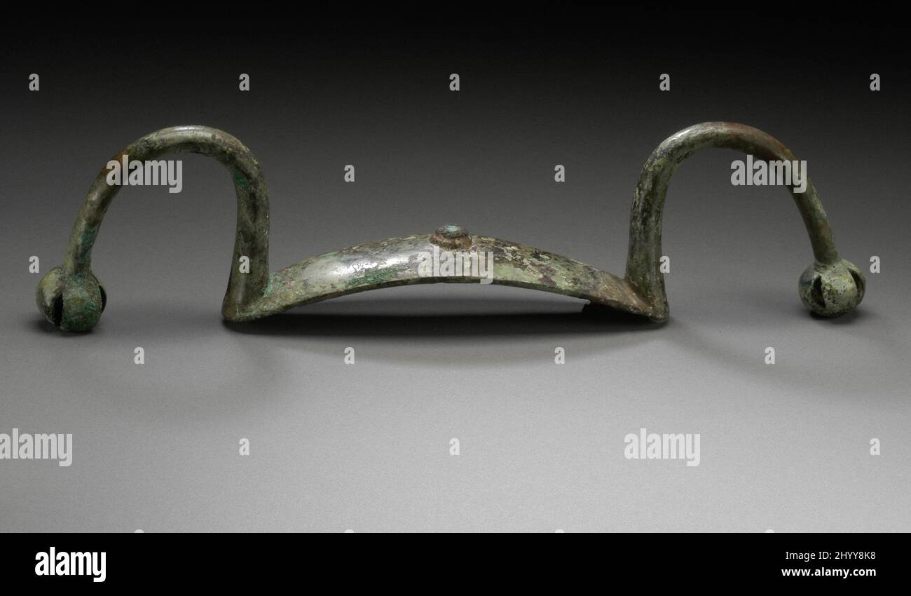 Wagenlenker oder Pferdeanbau mit Jingles. China, späte Shang-Dynastie, Anyang-Phase oder frühe westliche Zhou-Dynastie, etwa 1300-950 v. Chr.. Werkzeuge und Ausrüstung; Pferdezuweisungen. Bronzeguss mit türkisfarbener Einlage Stockfoto