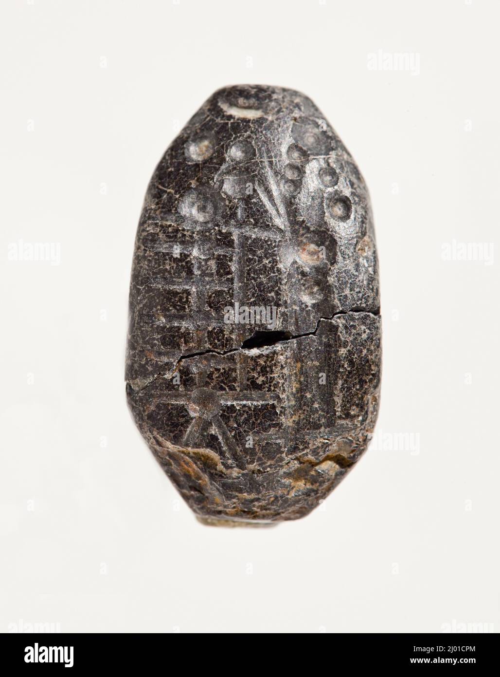 Stempelsiegel. Assyrien oder Mesopotamien, neo-assyrisch oder neo-babylonisch (Stil), Ende 7.-6. Jahrhundert v. Chr.. Werkzeuge und Geräte; Dichtungen. Schwarze Serpentin Stockfoto