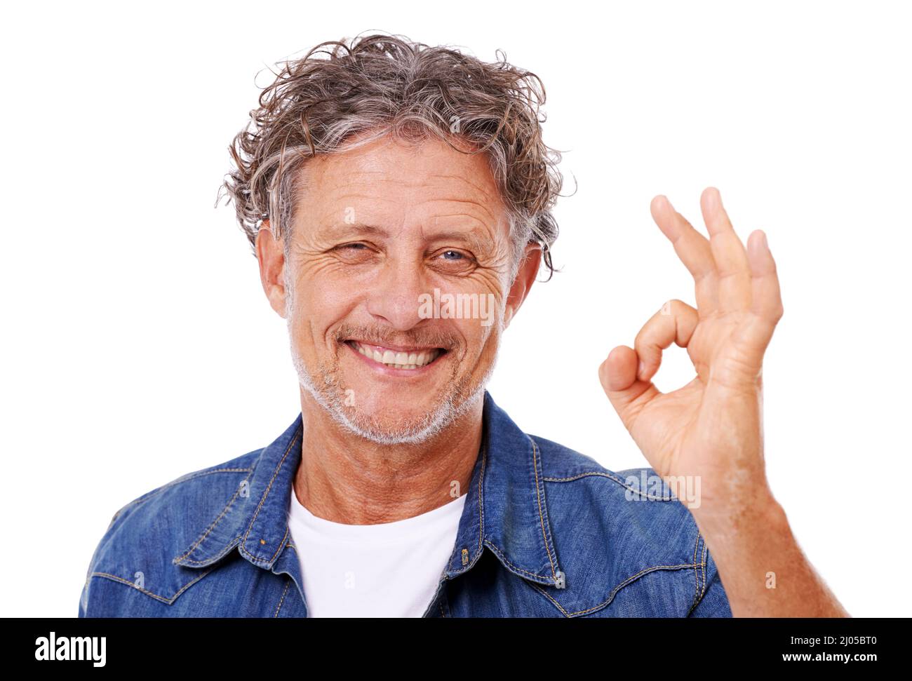 Sie sind erstklassig. Studioportrait eines positiv reifen Mannes, isoliert auf Weiß. Stockfoto