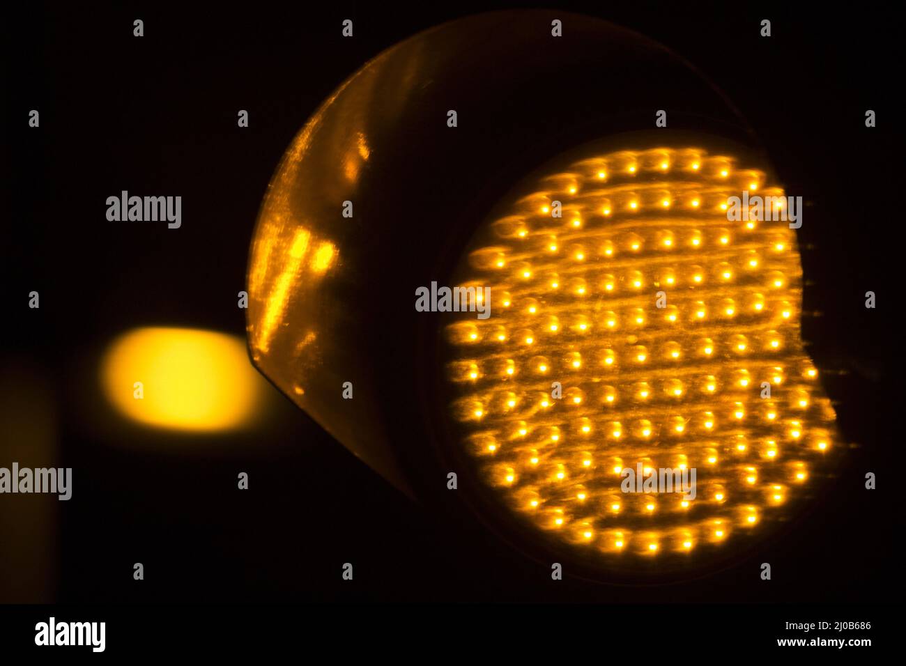 Orangefarbene gelbe Ampel Stockfoto