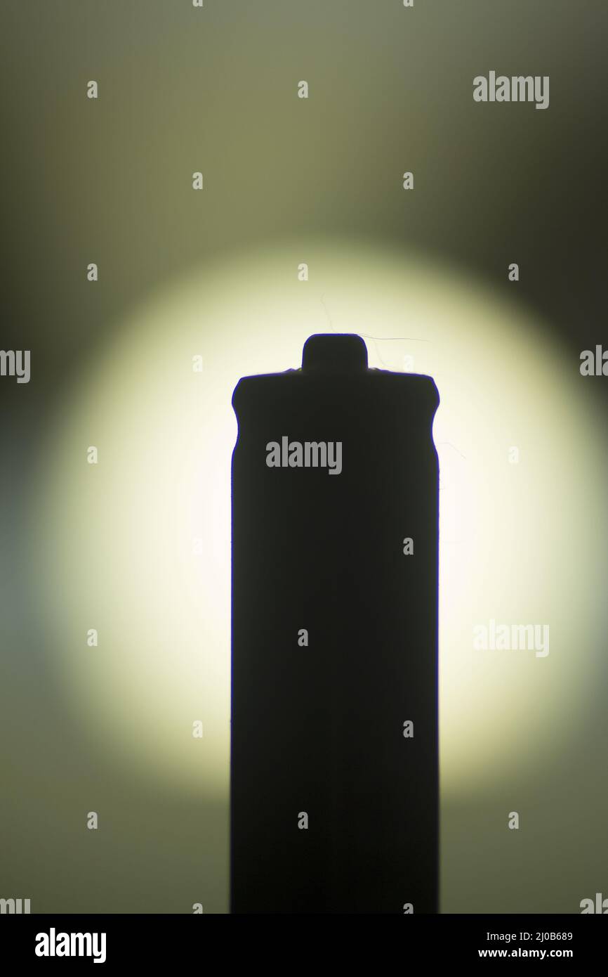 Silhouette der AAA-Batterie Stockfoto