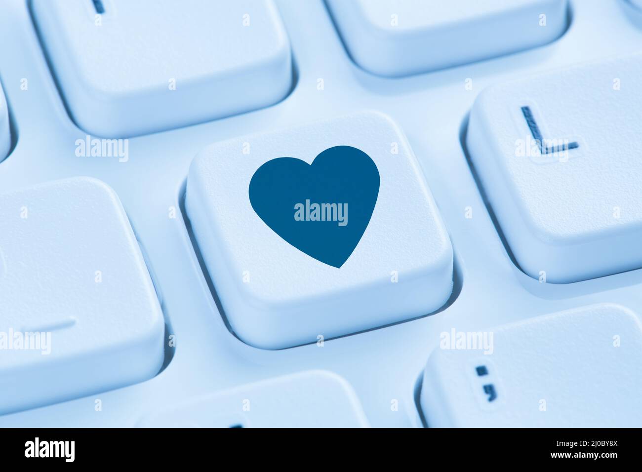 Partner Liebe Internet online Dating Herz blau Computer-Tastatur Stockfoto