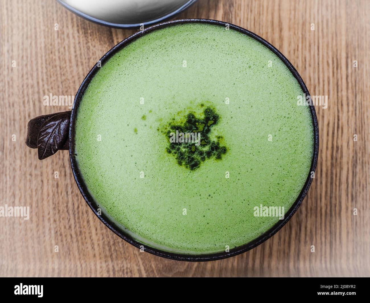 Grüner Tee Latte Kaffee in grünem Tee-Shop auf Osulloc Teemuseum, Insel Jeju, Südkorea. Stockfoto