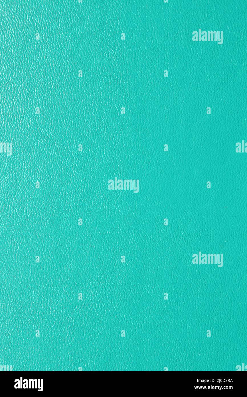 Eine leuchtend tealfarbener Kunstlederstruktur Stockfoto