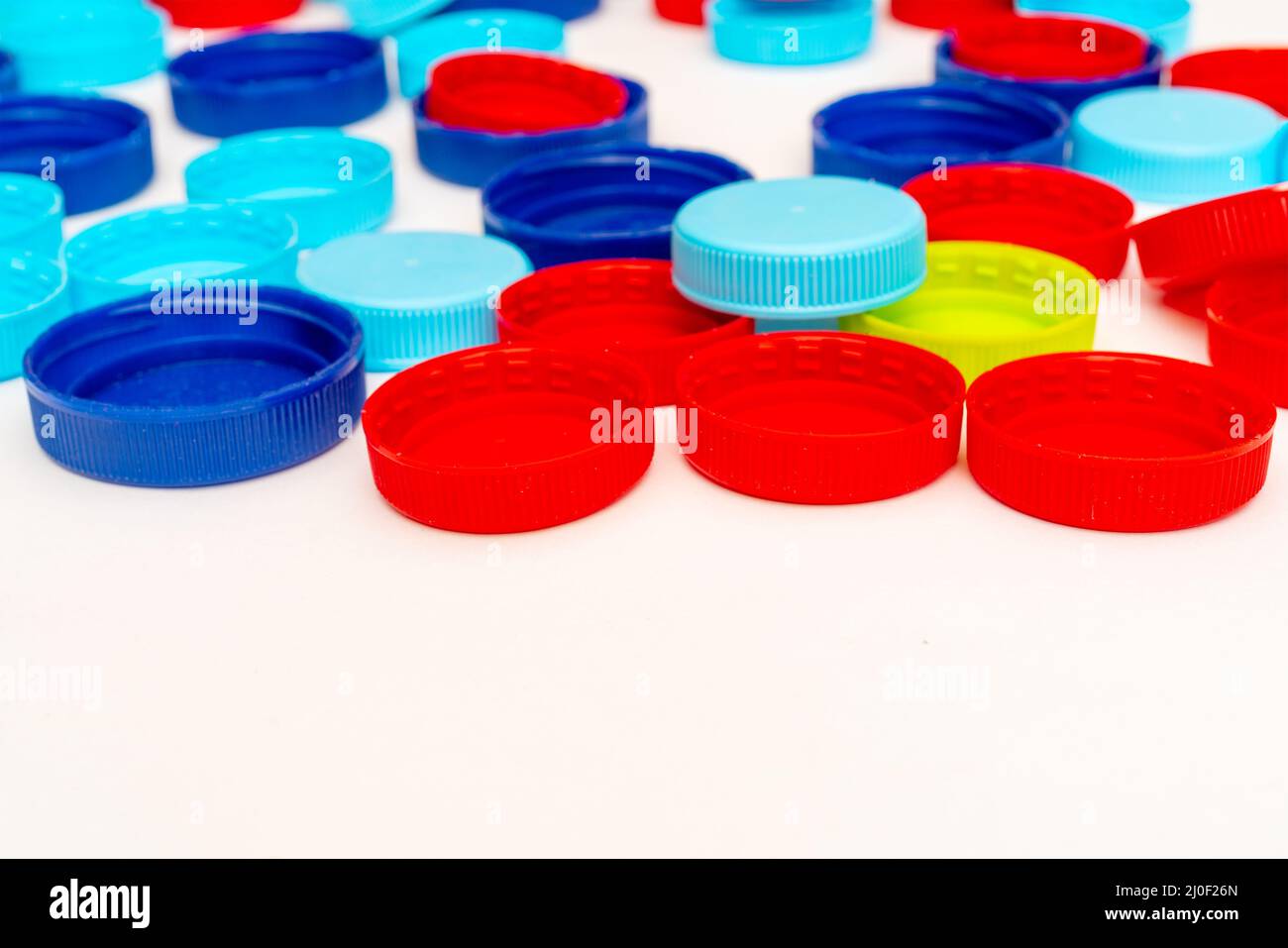 Kunststoffflaschen-Kappen. Separate Sammlung von Speicherabfällen. Abfallentsorgung. Stockfoto