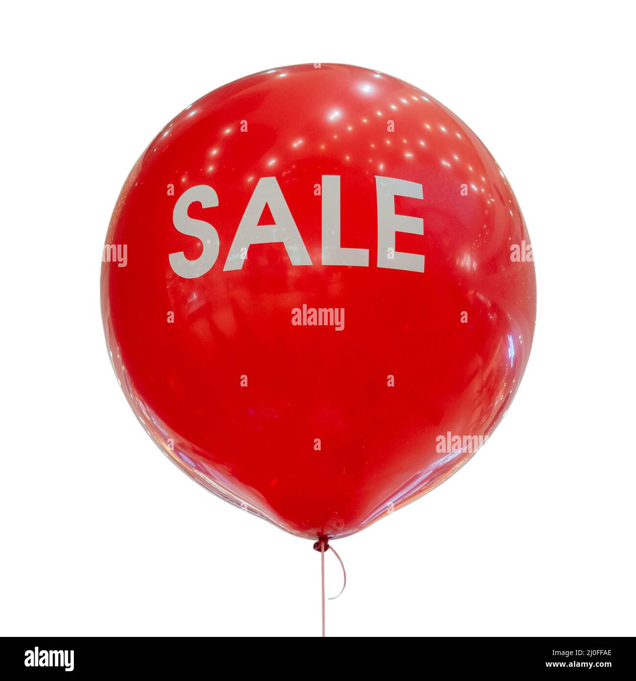 Leuchtend rote Ballon mit weißer Inschrift Verkauf auf isoliertem Hintergrund Stockfoto