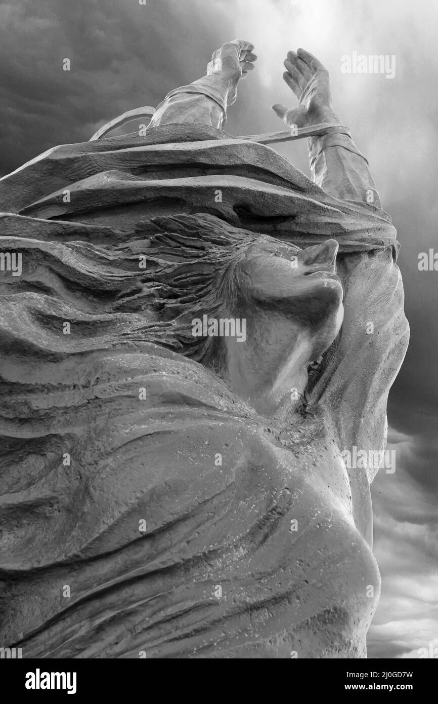 Statue mit ausgestreckten Armen Stockfoto