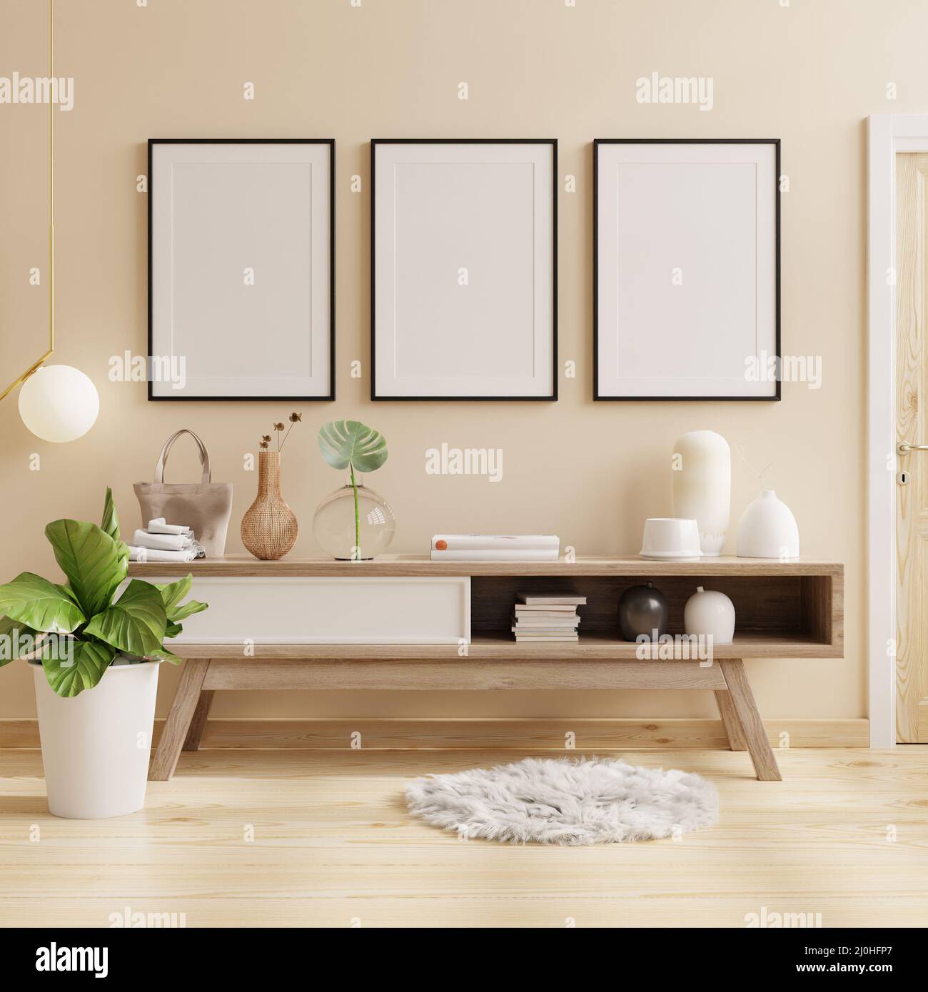 Poster mit schwarzem Rahmen auf Schrank in hellem Raum mit Pflanzen auf  cremefarbenem Wandhintergrund.3D Rendering Stockfotografie - Alamy