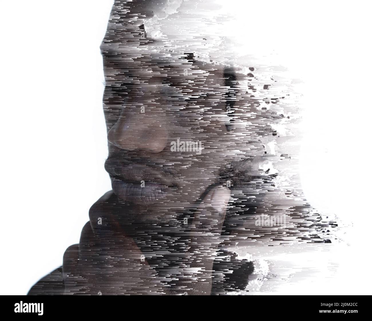Ein Porträt eines Mannes kombiniert mit digitaler Kunst in einer Doppelbelichtungstechnik Stockfoto