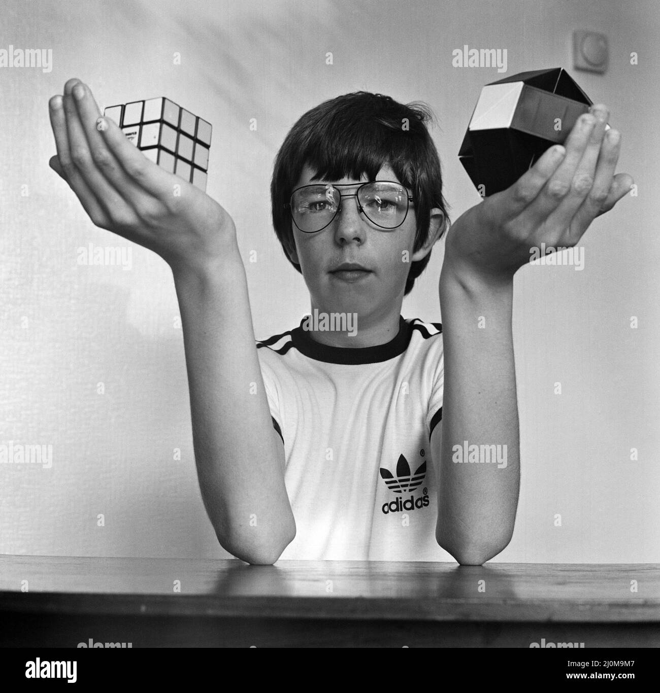 Der 14-jährige Terence Wilson aus Deepdale bei Preston mit seinem Rubik-Würfel und seiner Schlange. 28.. August 1981. Stockfoto