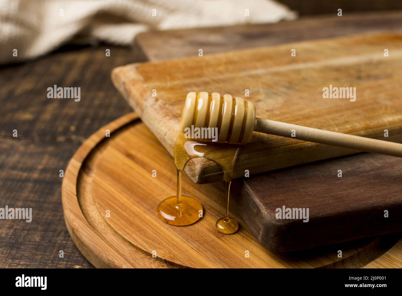 Löffel mit Honigfleck. Hohe Qualität und Auflösung schönes Fotokonzept Stockfoto
