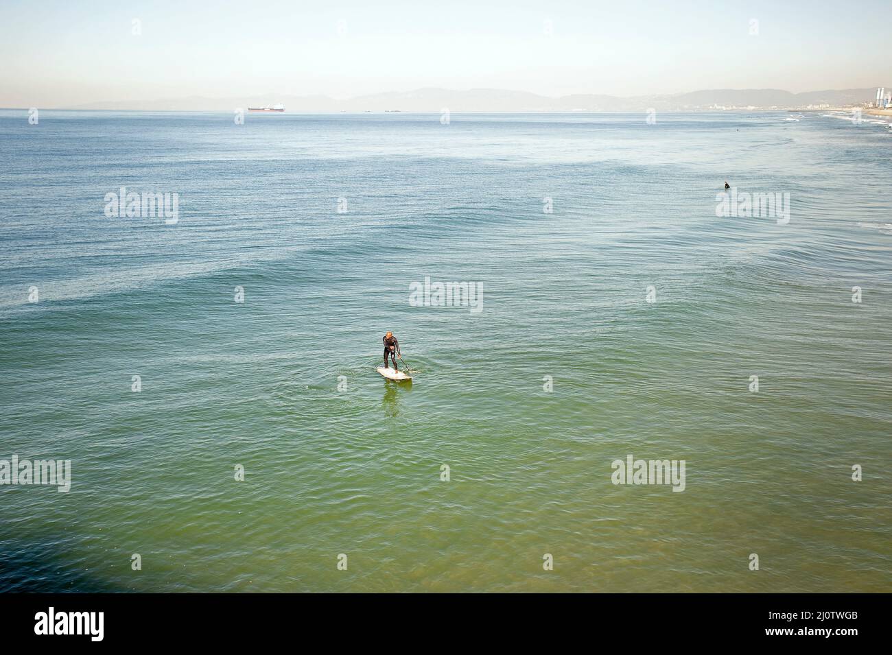 Stand-up Paddlebander Surfen. Stockfoto