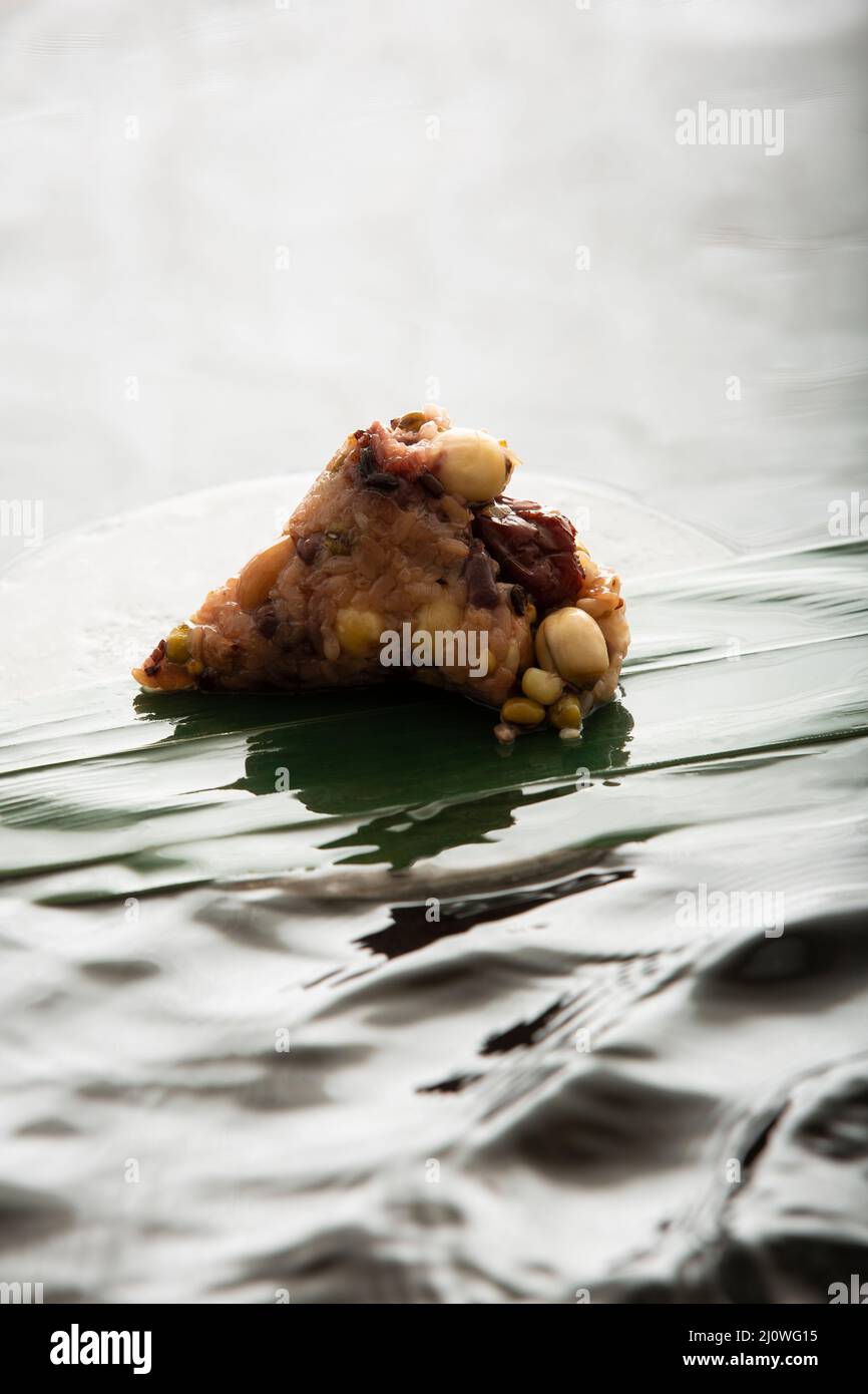 Kreative Fotografie, Zongzi mit acht Schätzen Stockfoto