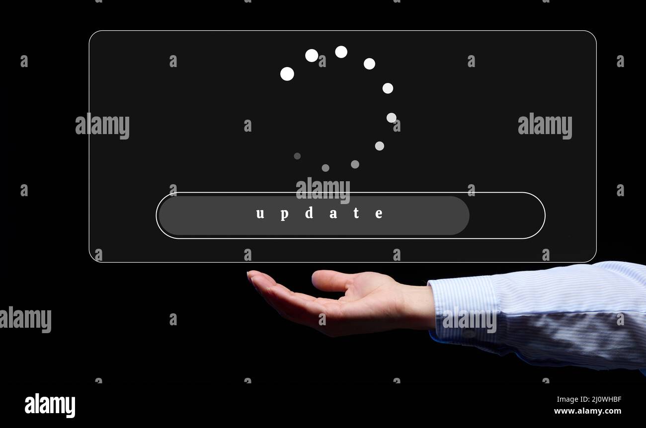 Der Prozess der Aktualisierung des Programms, Website. Die Gründung eines neuen Unternehmens und die Hand einer Frau auf schwarzem Hintergrund Stockfoto