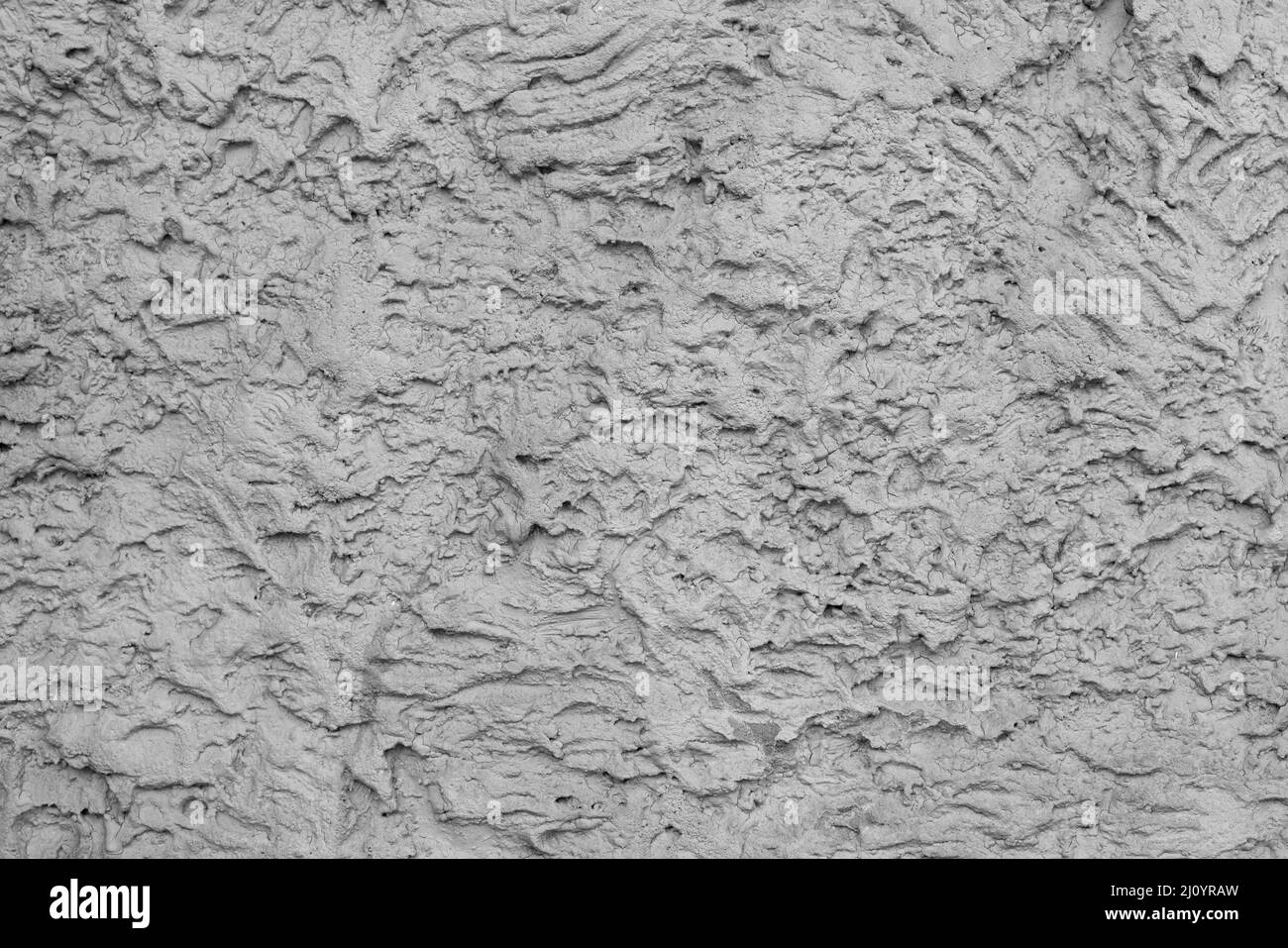 Grau Stuck an der Wand des Hauses. Bauindustrie. Stockfoto