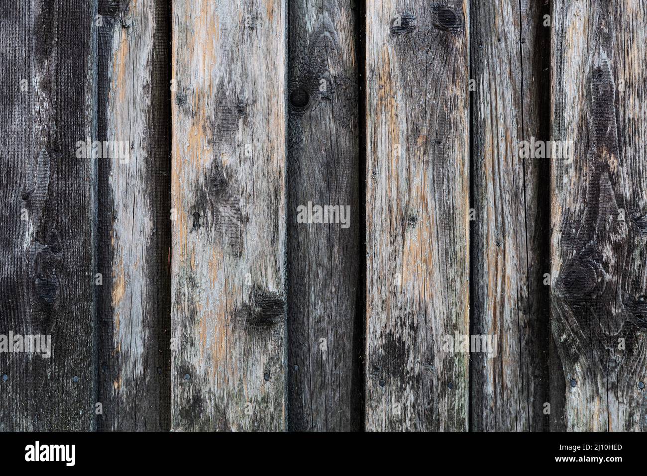 Rauh verwitterte Holzbretter oder Planken Hintergrund Stockfoto