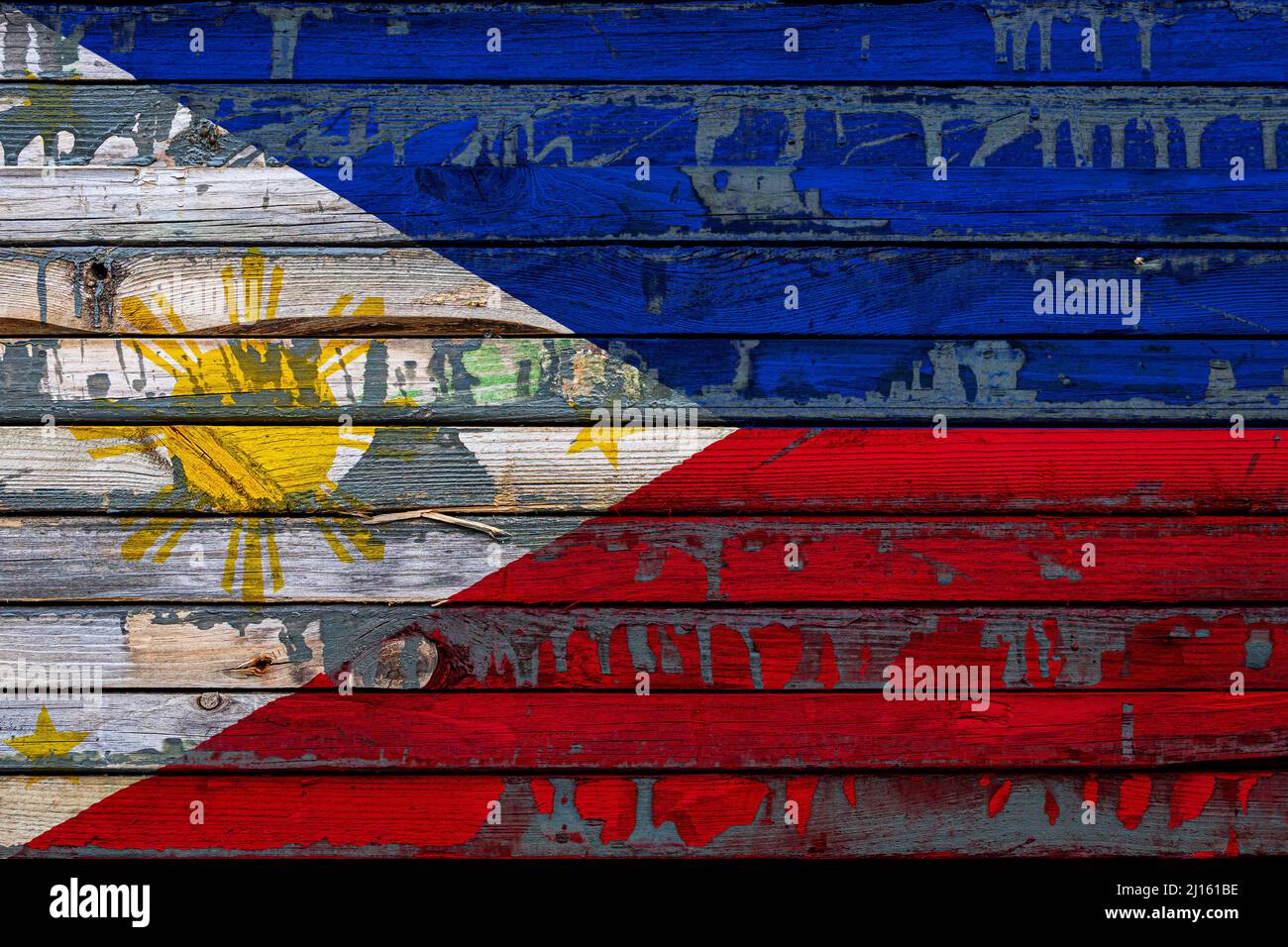 Die Nationalflagge der Philippinen ist auf unebenen Brettern gemalt. Ländersymbol. Stockfoto
