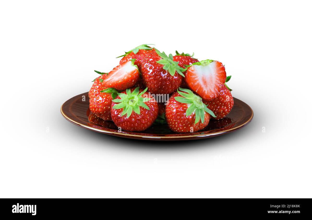 Leckere Erdbeeren auf einem Teller. Stockfoto