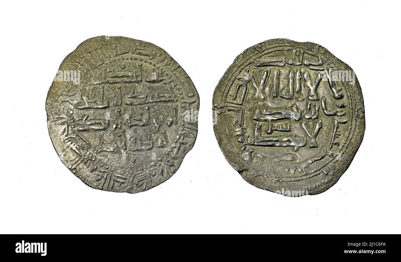 Bronze- und Silbermünze - Granada Nasrid Dirham. Stockfoto