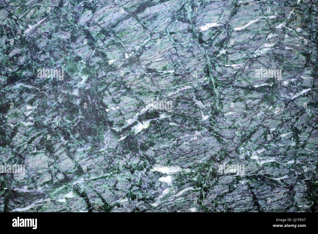 Grüner Marmor mit Blick auf polierten Stein Textur Hintergrund Stockfoto