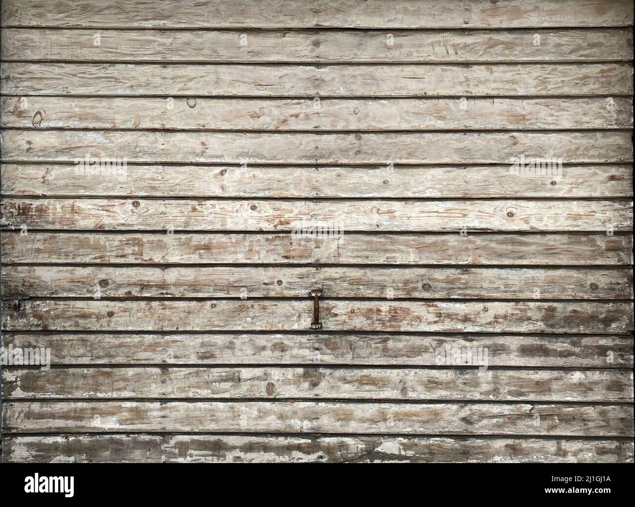 Eine rissige, abblätternde Holzstruktur Stockfoto