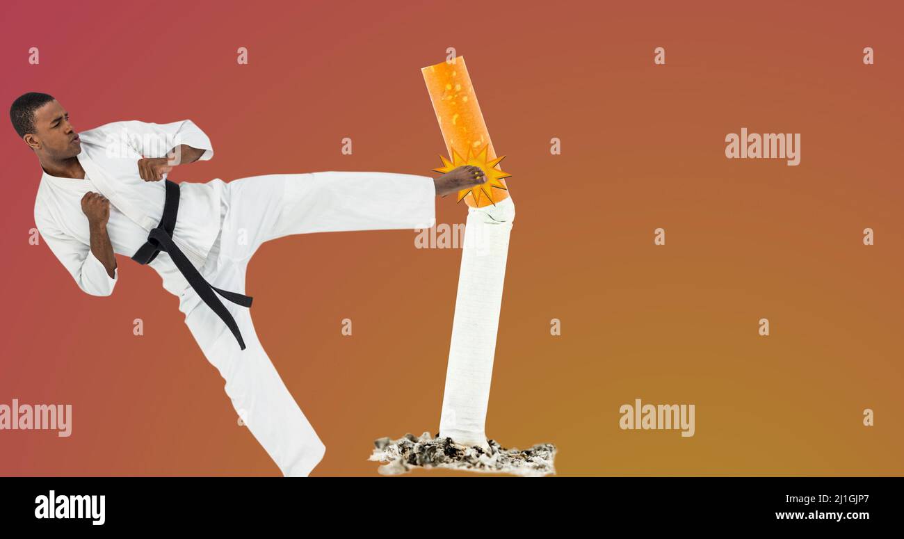 afroamerikanischer Kampfkünstler tritt Zigarette durch Kopierraum auf farbigem Hintergrund Stockfoto