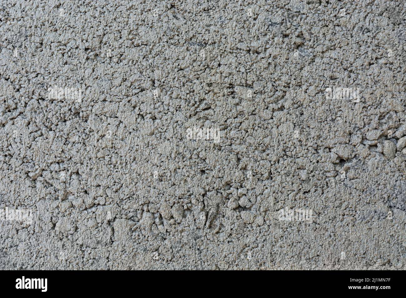 Betonoberfläche, Nahaufnahme der Zementwand, Hintergrundstruktur, Konstruktion und Mauerwerk Konzept Stockfoto