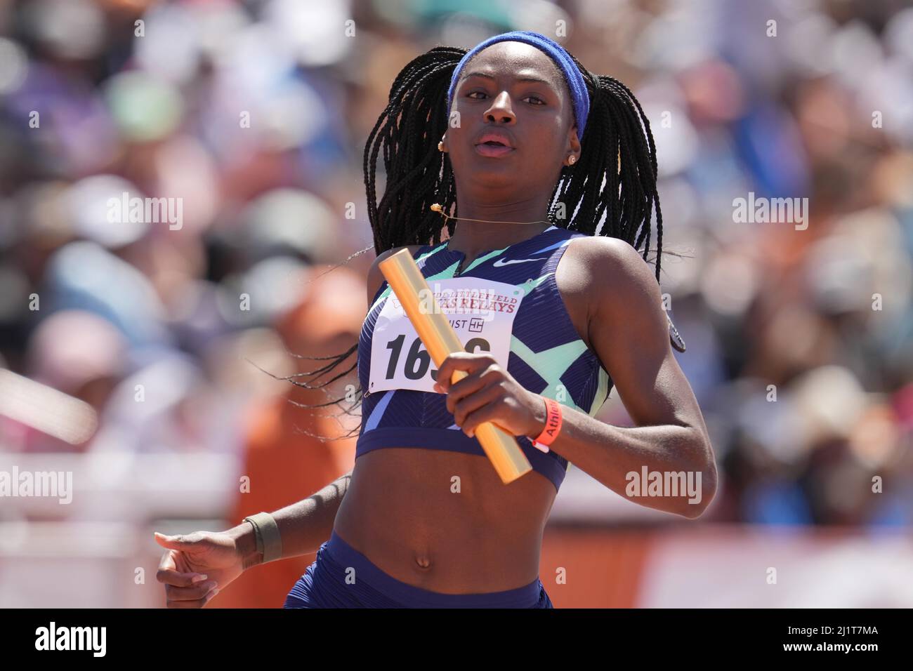 Twanisha Terry führt die Ankeretappe der Star Athletic Damen-Staffel mit 4 x 200m, die beim Clyde Littlefield Texas Re 94. in 1:30,55 die Hitze gewann Stockfoto