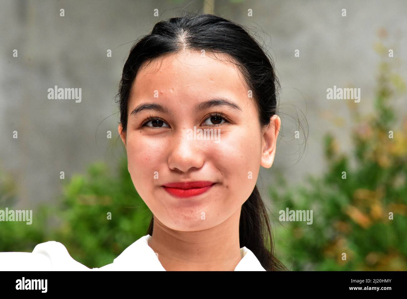 Eine glückliche asiatische Frau Nahaufnahme Stockfoto