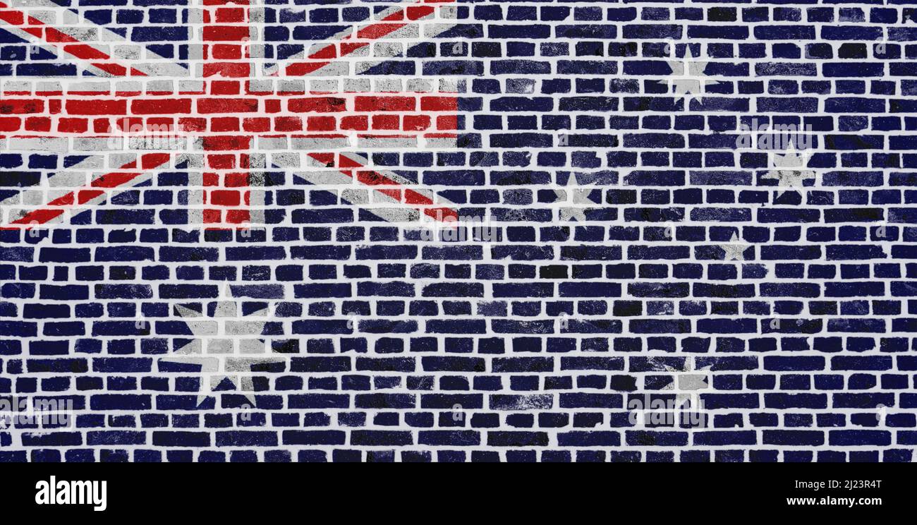 Nahaufnahme einer Ziegelwand mit der Flagge Australiens. Stockfoto