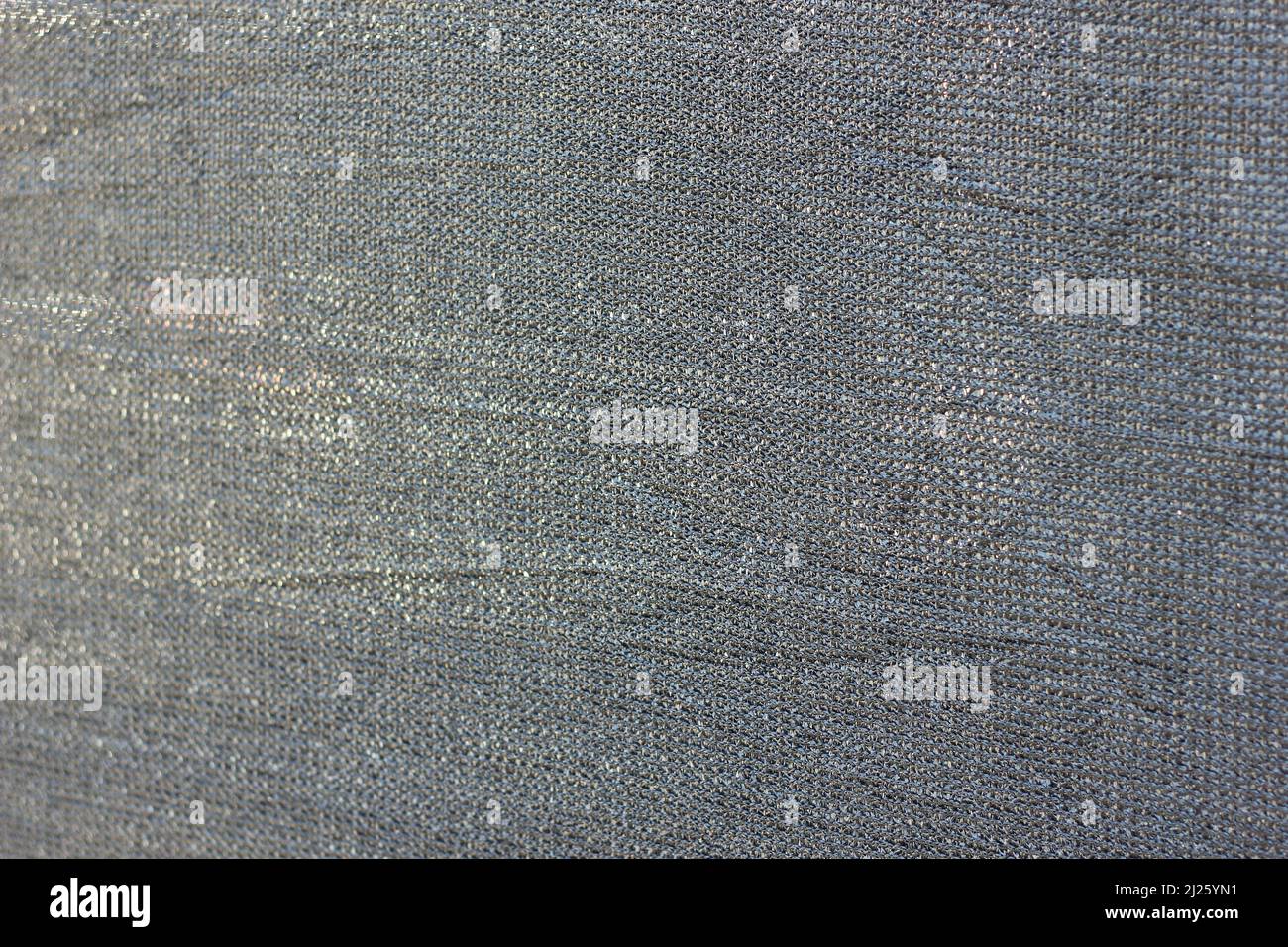 Vollgestell aus grauem Mesh aus modernem Stoff. Stockfoto