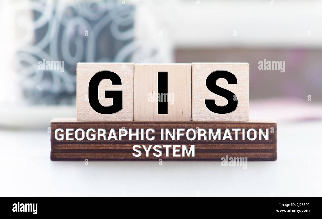 Tag der geografischen Informationssysteme.Wörter aus Holzwürfeln mit Buchstaben Foto. Stockfoto