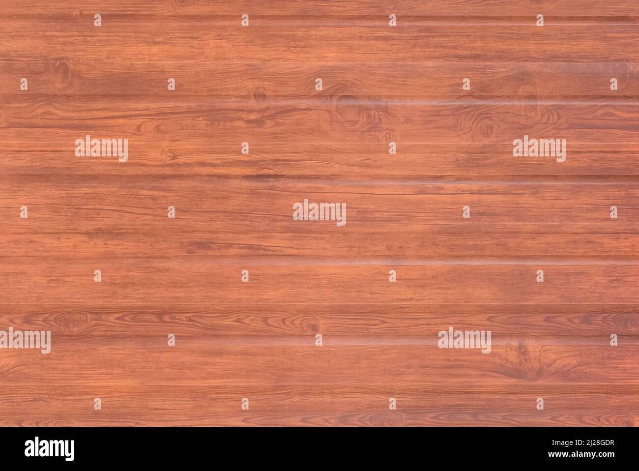 Braun-orange Licht künstliche Holzbeschichtung Imitation von natürlichen Zaun Textur Holz Hintergrund. Stockfoto