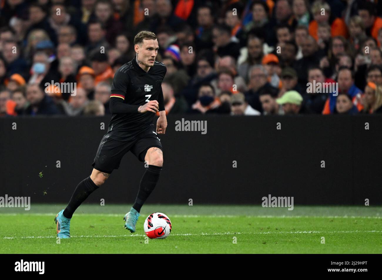 Amsterdam, Niederlande. 29. März 2022. Fußball: Nationalspieler, Niederlande - Deutschland, Johann Cruyff Arena. Deutschlands David Raum in Aktion. Quelle: Federico Gambarini/dpa/Alamy Live News Stockfoto