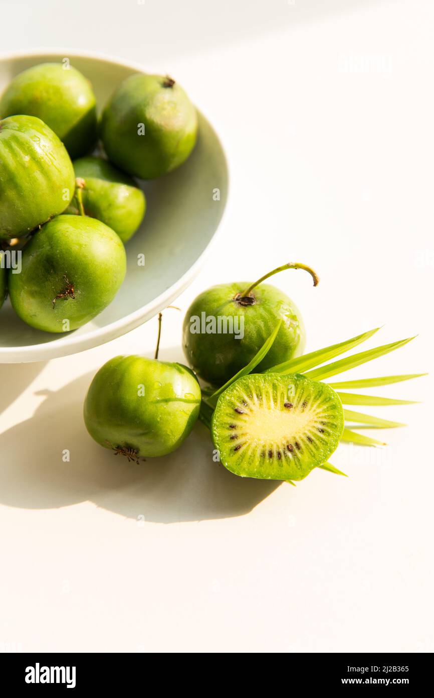 Stillleben, Mini Kiwis Früchte Stockfoto