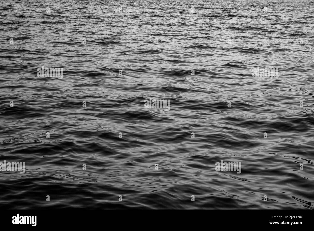 Nahaufnahme des Meereshintergrunds. Ein Backing mit Meereswellen-Textur für Branding, Kalender, Postkarte, Bildschirmschoner, Wallpaper, Poster, Banner, Cover, Website. A Stockfoto